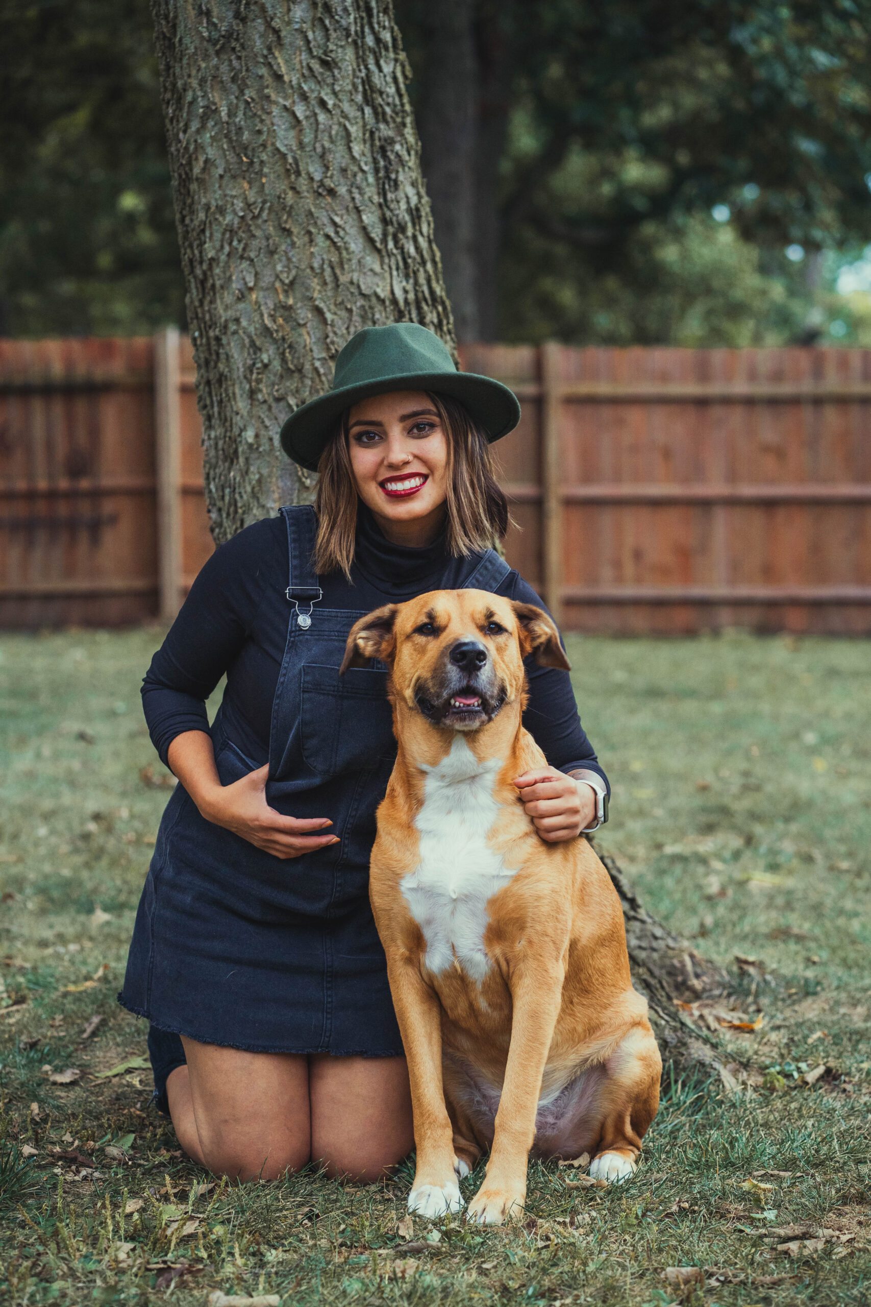 portrait photography portfolio woman with dog in a field